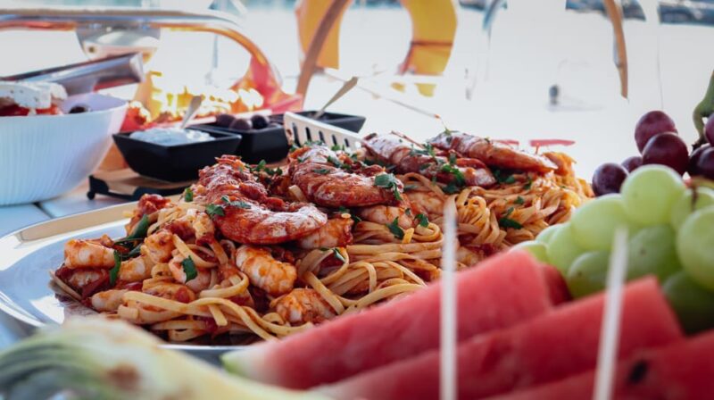 Heraklion: Dia Island Small Group Catamaran Cruise With Meal - Onboard Meal and Drinks