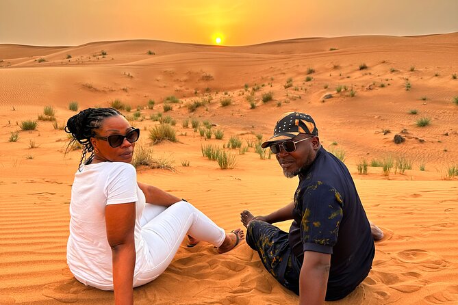 Private Desert Safari Camel Ride Sandboard & Buffet BBQ Dinner - Dune Bashing and Sandboarding Fun