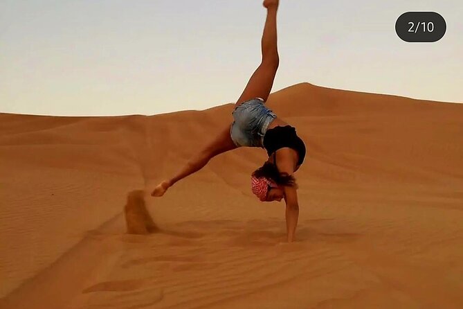 Quad Bike Dubai Desert Safari With BBQ Dinner Sandboard and Show - Mesmerizing Live Entertainment