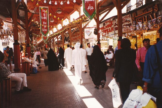Royal Vision Walking Around Old Dubai Tour With Abra, English Guide - Discovering Traditional Souks and Markets