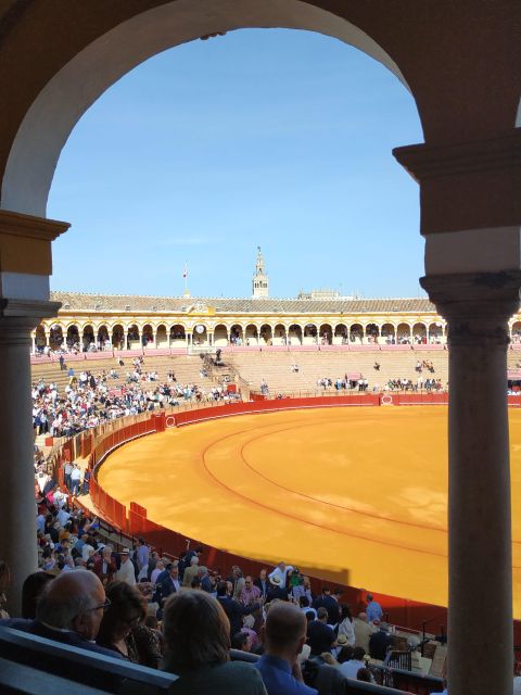 Seville: Plaza De Toros and Barrio Santa Cruz Tour - Sevilles Iconic Plaza De Toros