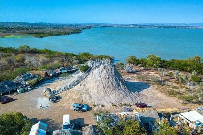 Tour to Mud Volcano With Pool and Beach With Lunch Included - Beach Club Experience