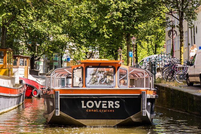 Amsterdam 1-Hour Sightseeing Canal Cruise by Semi-Open Boat - Audio-Guide and Commentary