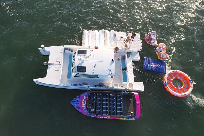 Aquatic Adventure: Boat Tour With Jetskis, Tubing, and Open Bar - Tubing and Water Mat Fun