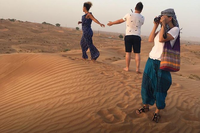 Evening Red Dunes Desert Safari: BBQ Dinner & Adventure Awaits! - Relaxing Camel Rides