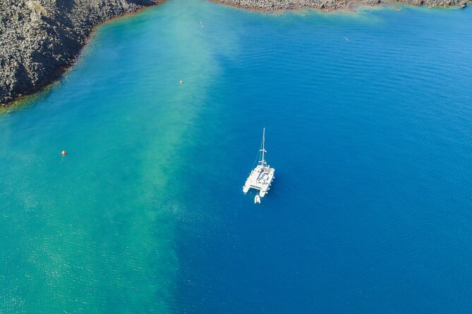 Full Day Santorini Catamaran Private Cruise With Meal and Transfer - Personalized Pickup and Transfer
