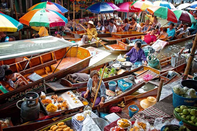 Private Guided Tour to Train Market and Damnoensaduak Floating Market - Traveler Reviews