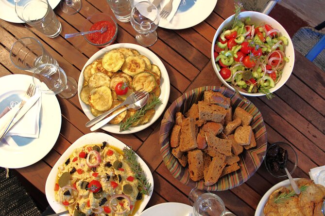 Santorini Family Farm Food & Wine Tour With Cooking Class - Scenic Backdrops and Shared Moments