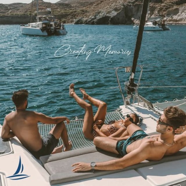 Santorini: Private Catamaran Sunset Cruise With Dinner - Tour Guide and Language