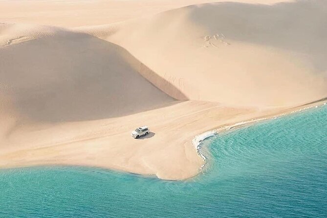 4hr Desert Safari: Sunset,Sunrise,Camel,Sand Boarding,Inland Sea - Visiting the Inland Sea