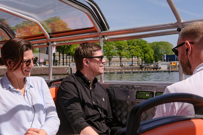 Amsterdam 1-Hour Sightseeing Canal Cruise by Semi-Open Boat - Accessibility and Restrictions