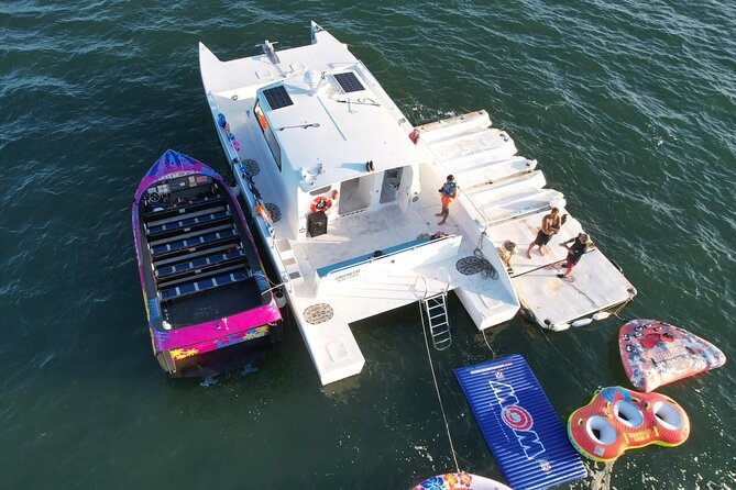 Aquatic Adventure: Boat Tour With Jetskis, Tubing, and Open Bar - Onboard Beverages and Snacks