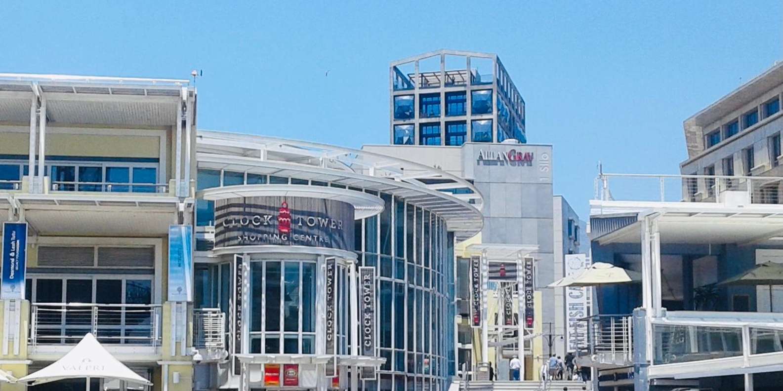 Cape Town: V&A Waterfront Walking Tour With a Local Taste - Enjoying Busker Performances