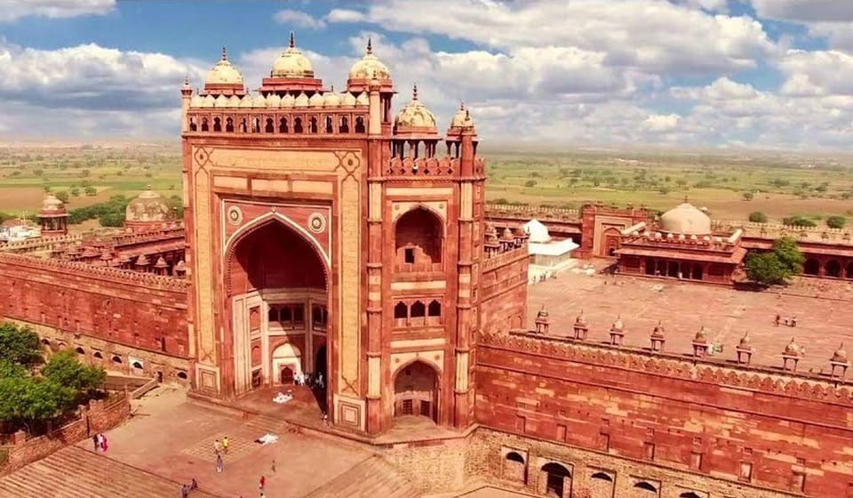 From New Delhi: Overnight Taj Mahal Tour With Fatehpur Sikri - Guided Experience and Accessibility