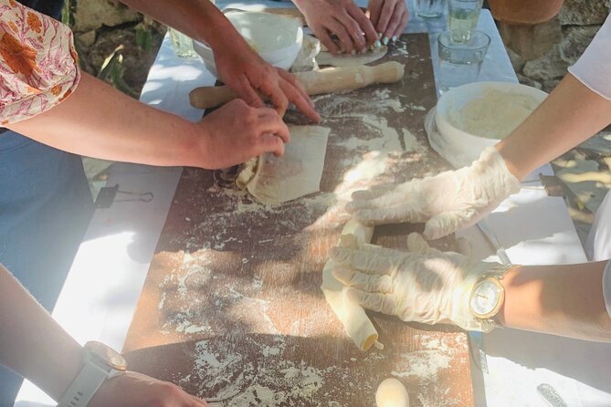 Heraklion: Cretan Private Cooking Lesson With Lunch in Arolithos - Local Wine and Mineral Water