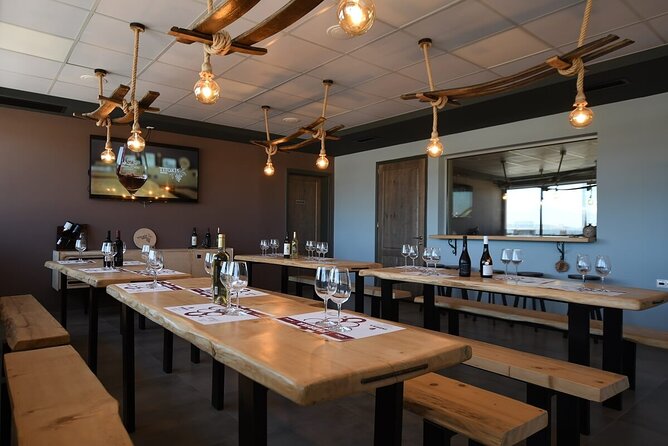 Semi-Private Premium Wine Tasting at Titakis Winery With Transfer - Review Highlights
