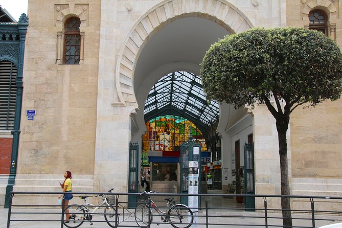 Tour Paella and Malaga Market With an Official Guide - Celebrating Local Culture