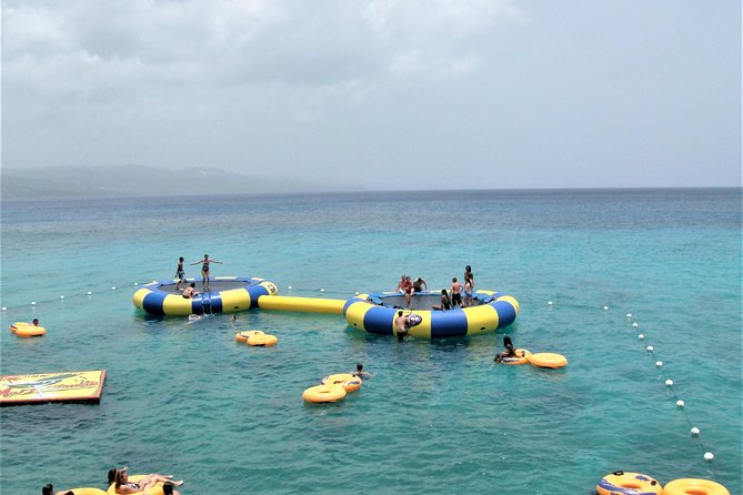 Day Trip to Doctors Cave Beach, Margaritaville and Hip-Strip Shopping From Falmouth - Cancellation Policy and Group Size