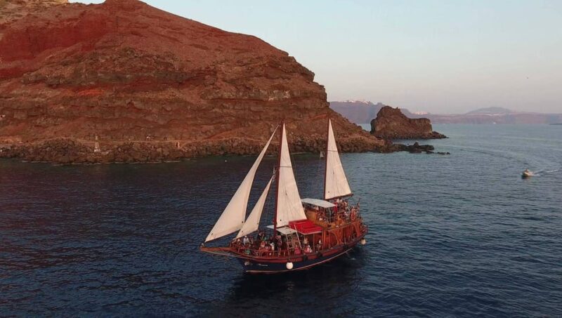 Fira: Sunset Cruise With Volcano Hike, Hot Springs & Wine - Recommended Attire and Belongings