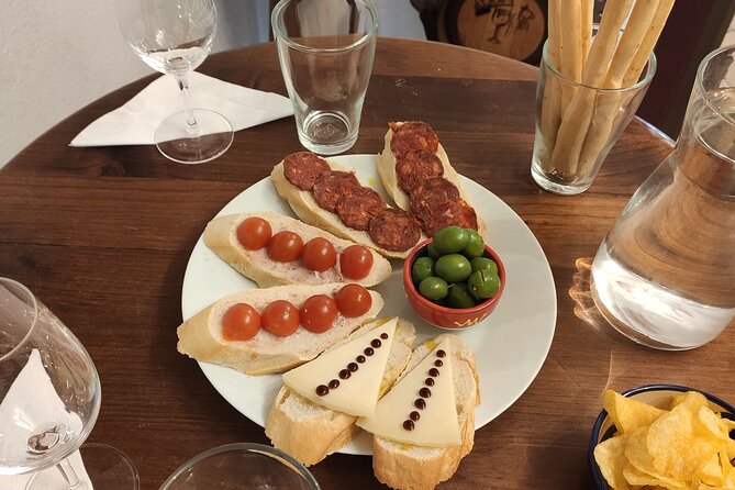 Indulge in Cordoba: Local Wines & Tapas Tasting - Unique Experiences