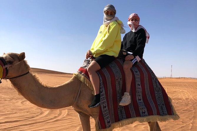 One Hour Quad Bike at Red Sand Desert Safari With Camel Ride and BBQ Dinner - Travel Tips