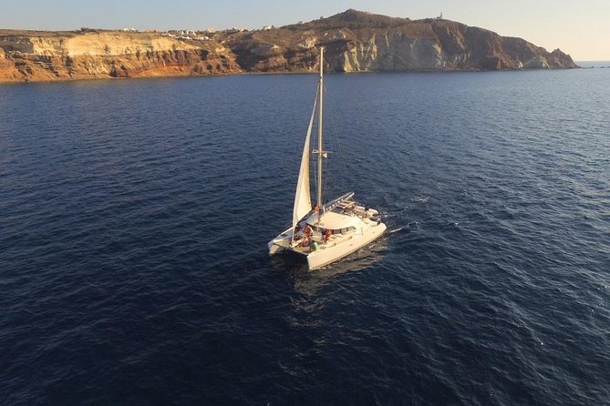 Santorini Full Day Catamaran Private Cruise Incl. Meal, Drinks & Free Transport - Flexible Booking and Cancellation Policy