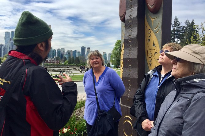 Spoken Treasures: Stanley Park Indigenous Walking Tour - Symbolic Totem Poles