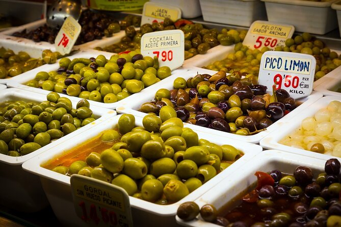 Tour Paella and Malaga Market With an Official Guide - Sampling the Menu