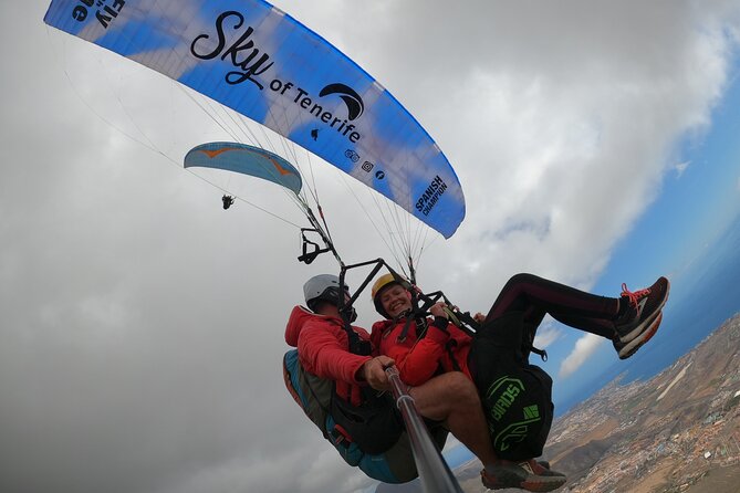 Acrobatic Paragliding Flight With Spanish Champion in Tenerife - Transportation and Photography Options