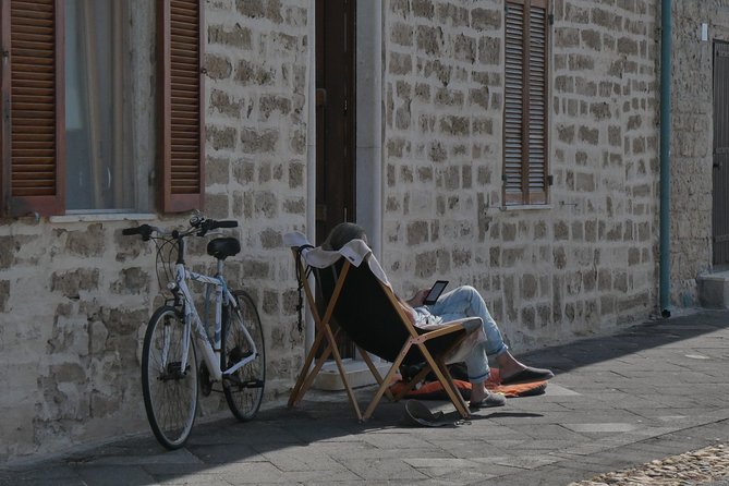 Alghero: Walking Tour With Bilingual Local Guide - Accessibility and Cancellation