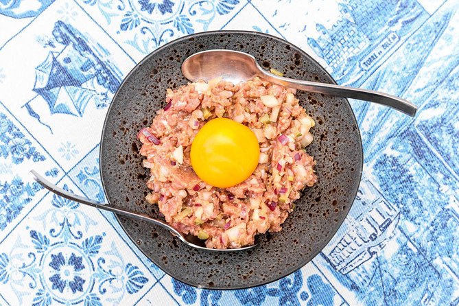 Authentic Portuguese Cooking Class and Dinner in a Lisbon Home - Price and Guarantee