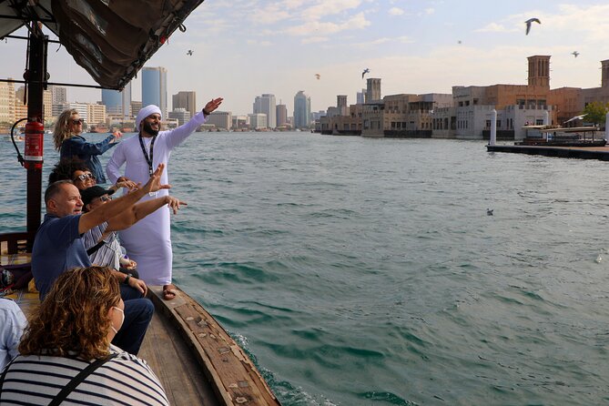 Dubai: Photography Tour in Al Fahidi District W/Abra Ride - Booking Information and Pricing