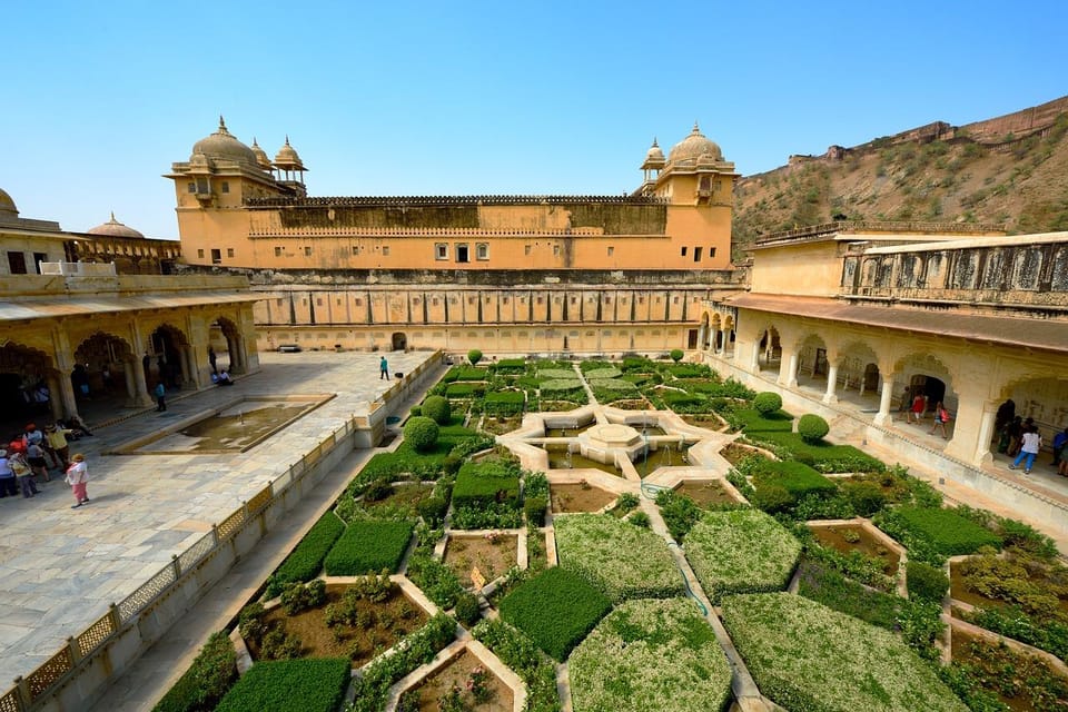 From Delhi: Monkey Temple and Jaipur City Guided Tour by Car - Exploring Jal Mahal