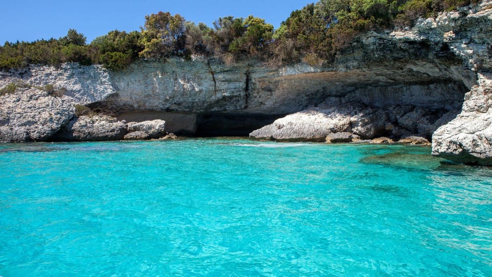 From Santa Teresa Gallura: Dinghy Tour to Corsica - Cancellation and Booking Flexibility