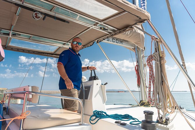 Hersonissos Sunset Catamaran Cruise With Finger Food & Drinks - Activities and Onboard Experiences