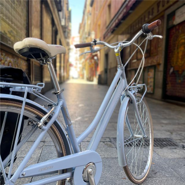 Madrid: Vintage Bike Rental With Tourist Map - The Sum Up