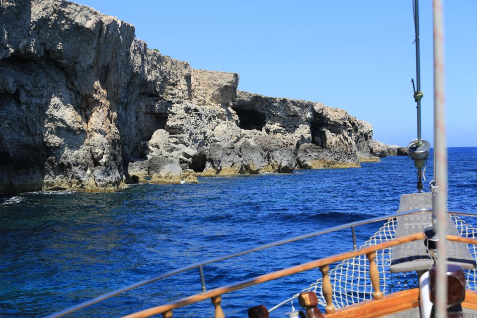 Malta: Comino, Blue Lagoon, and Caves Day Trip - Cruising Past Landmarks