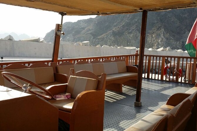 Omani Traditional Dhow Cruise: Sunset and Muscat Coastal View - Exploring the Muscat Coastline