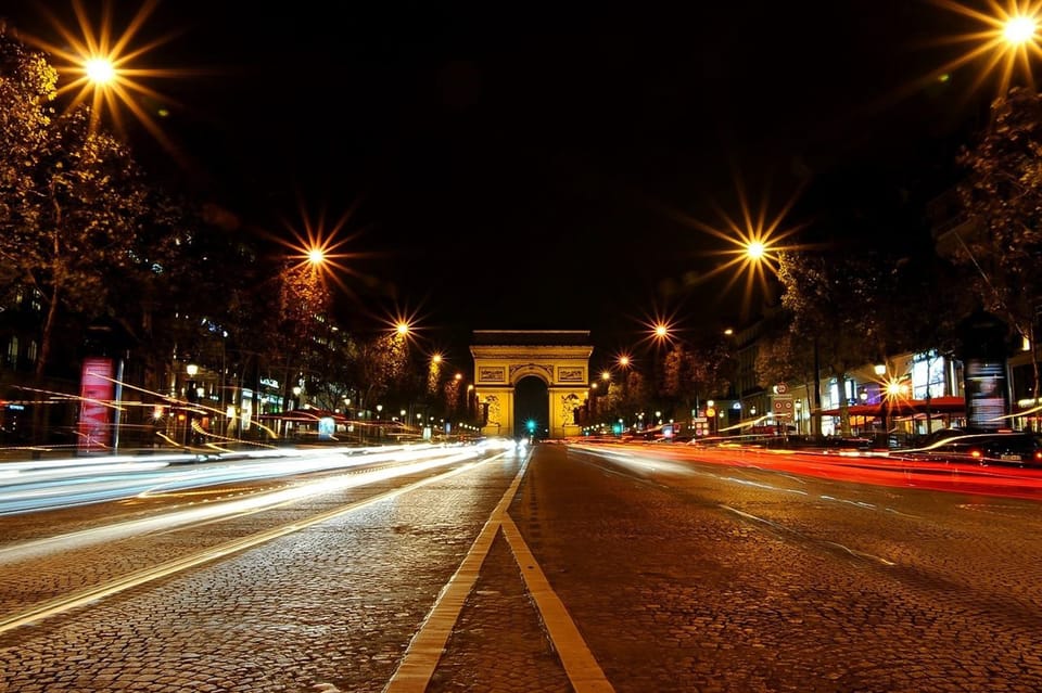 Paris: Illuminated Walking Tour in Spanish - Frequently Asked Questions