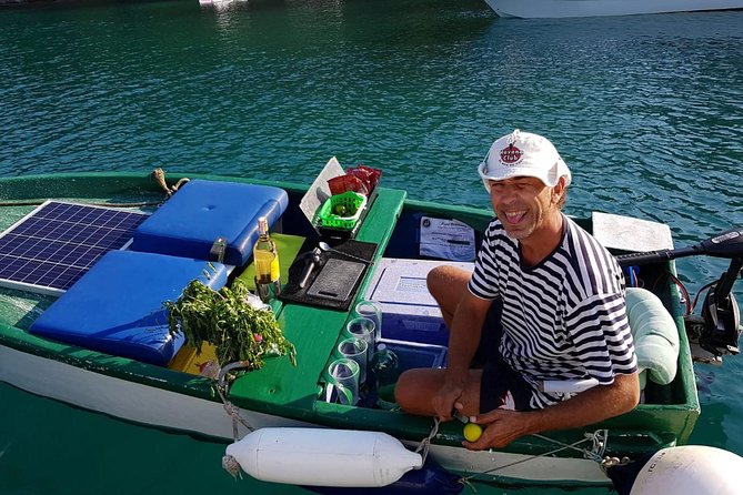 Private Full-Day Croatian Islands Boat Tour From Trogir - Visiting Maslinica