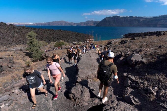 Santorini Old Port: Boat Cruise to the Volcano & Hot Springs - Booking and Cancellation