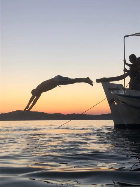 Skiathos: Boat Cruise With Dinner & Sunset Viewing - Exploring Deserted Islands