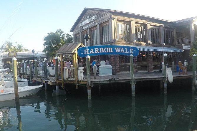 Full-Day Key West Tour and Coral Reef Snorkeling With Open Bar - Cancellation Policy and Considerations