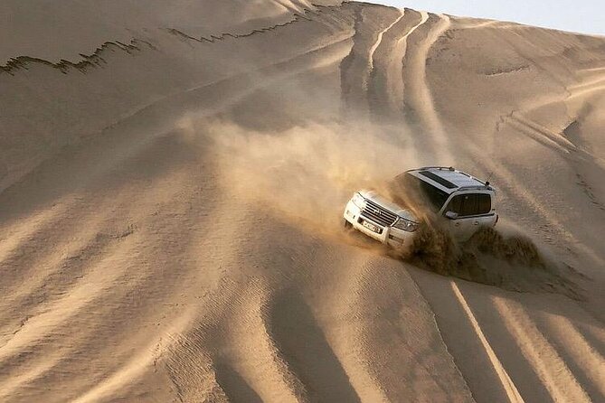 Half Day Desert Safari and Inland Sea With Sand Boarding - Pricing and Booking Options