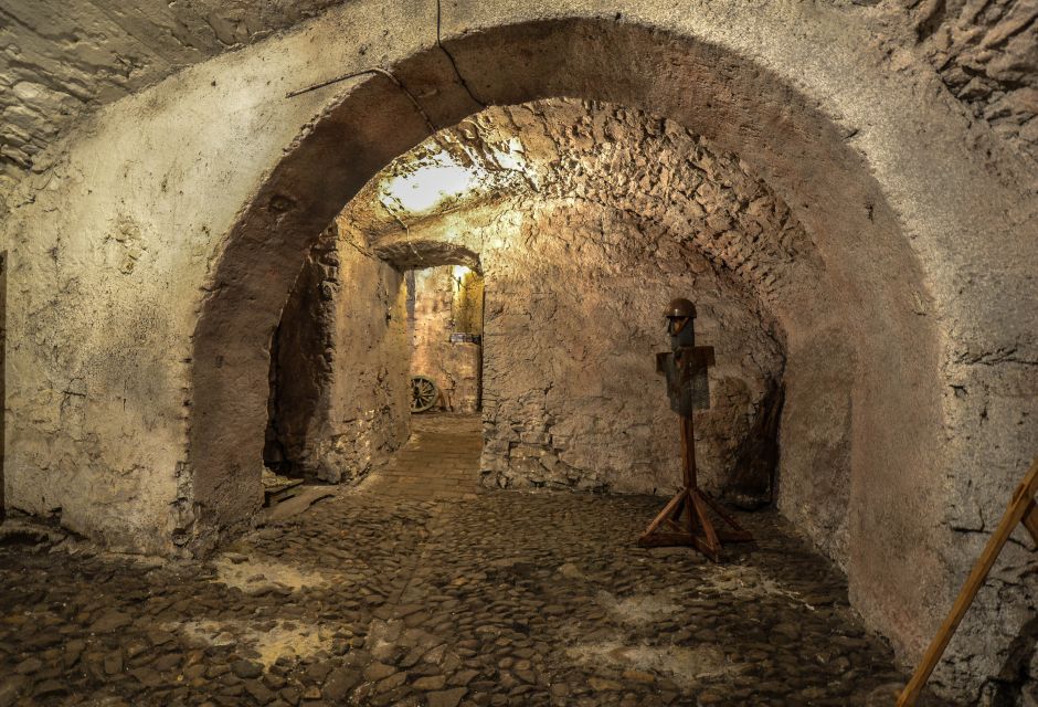 Prague: Ghosts, Legends, Medieval Underground & Dungeon Tour - Navigating Cobblestone Streets and Alleys