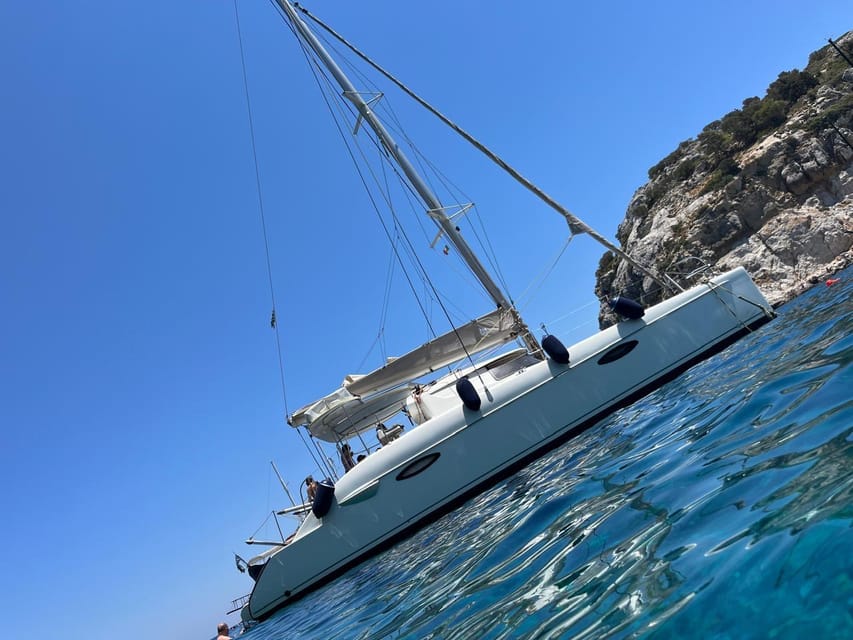 Rhodes Private Half Day Sailing Catamaran Cruise With Drinks - Booking and Policies