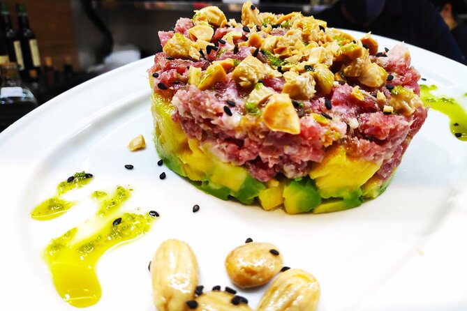 Tour Paella and Malaga Market With an Official Guide - Traveler Feedback and Recommendations