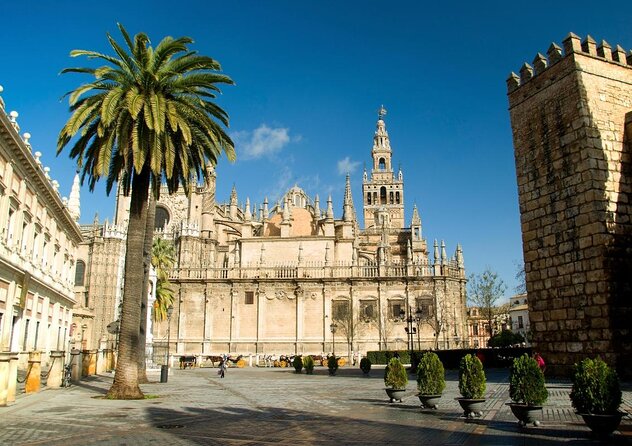 Alcazar, Cathedral, Santa Cruz Quarter, Bullring and River Cruise Tour in Seville - Sevilles UNESCO Wonders