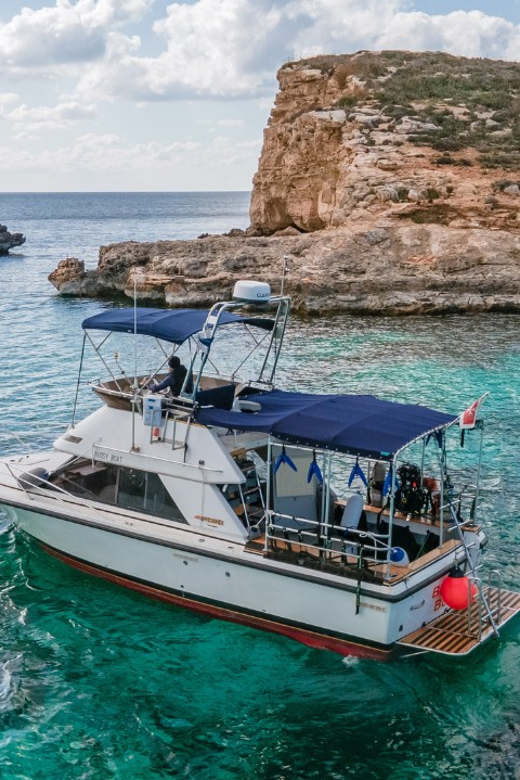 Boat for Scuba Divers: Dive Trip Around Comino Island - Diving Locations