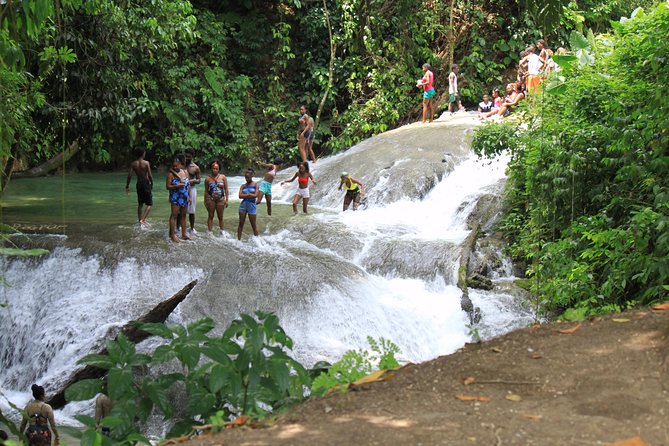 Benta River Falls & Ricks Cafe Day Tour From Grand Palladium